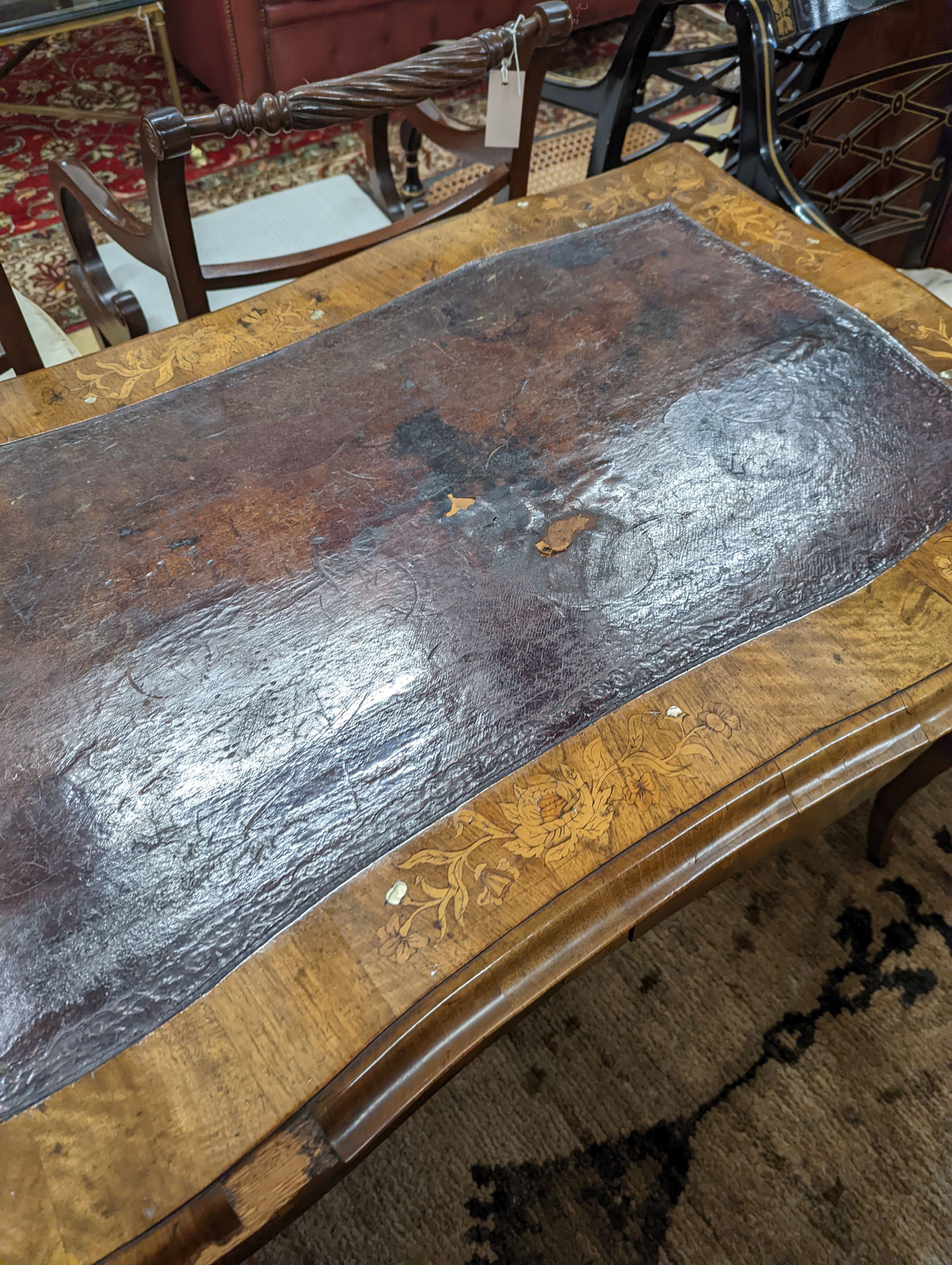 A 19th century mother of pearl and marquetry inlaid writing table, width 120cm, depth 65cm, height 73cm